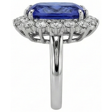 natural round tanzanite 6.50ct ring on white background