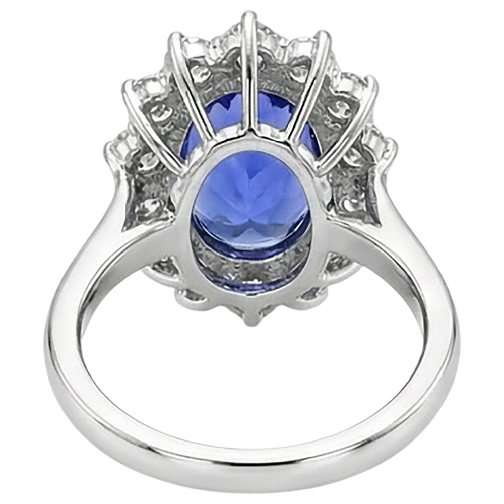 natural round tanzanite 2ct ring on white background