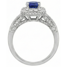 natural round tanzanite 3.61ct ring on white background