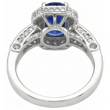 natural round tanzanite 3.61ct ring with diamond accents