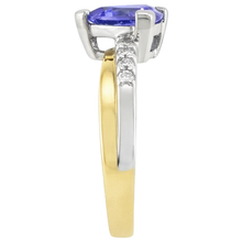 natural round tanzanite 2.60ct ring on white background