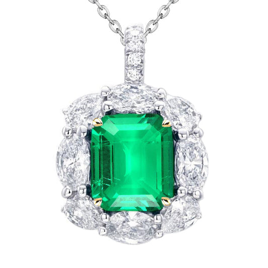 Emerald Cut Fine Emerald ring in 14 Karat Two Tone Gold – main view