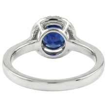 natural round sapphire 2.5ct ring on white background
