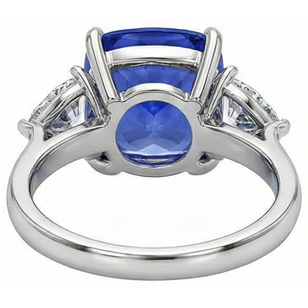natural cushion sapphire 3ct ring on white background