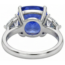 natural cushion sapphire 3ct ring on white background
