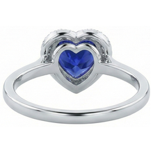 natural round sapphire 4ct ring on white background
