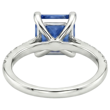 natural round sapphire 4ct ring on white background