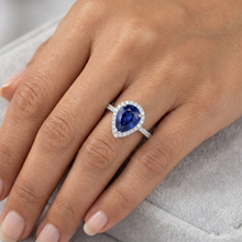 natural round sapphire 3.25ct ring on white background