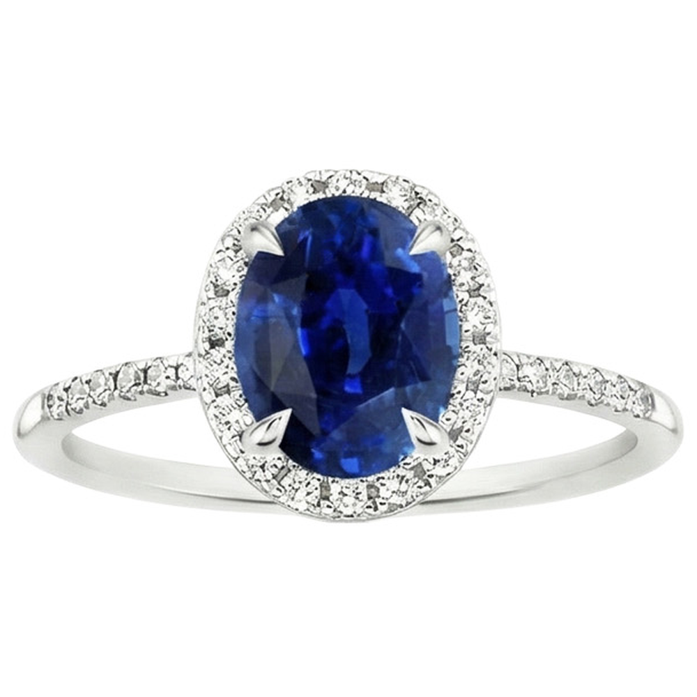 natural round sapphire 3.25ct ring on white background