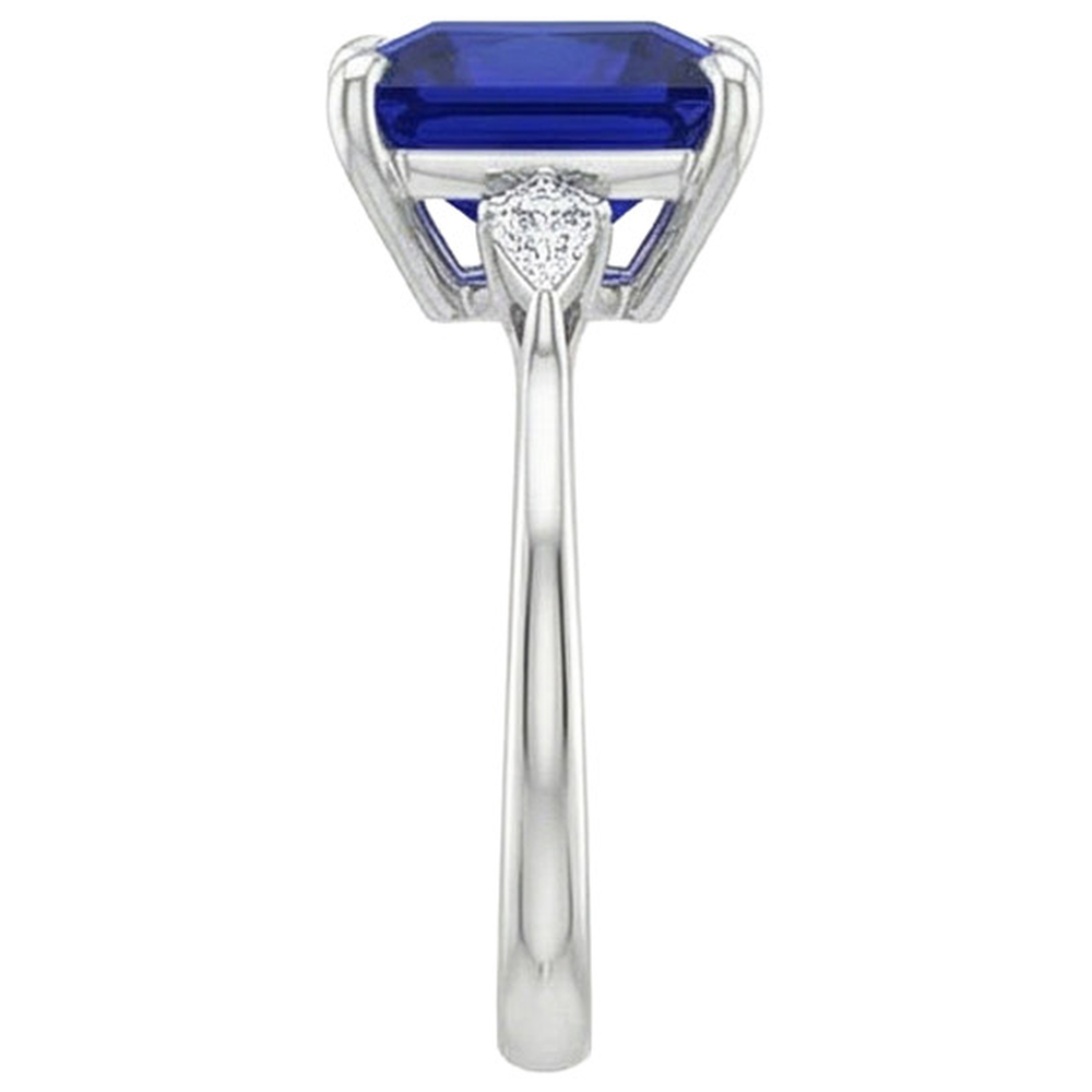 natural round sapphire 5.25ct ring on white background