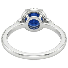 natural round sapphire 3ct ring on white background