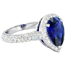 natural round sapphire 4ct ring on white background