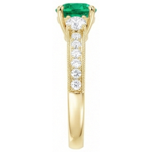 Round Cut Fine Emerald ring in 14K Yellow Gold – angle view
