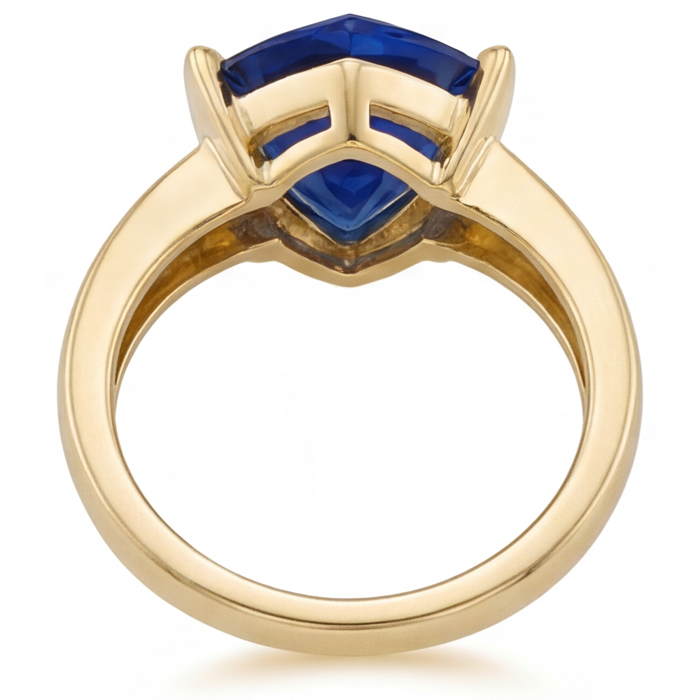 Blue Sapphire Trillion Cut Gemstone Ring in 14 Karat Yellow Gold – angle view