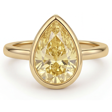Pear Shape Canary Yellow Diamond ring in 14 Karat Yellow Gold – side view