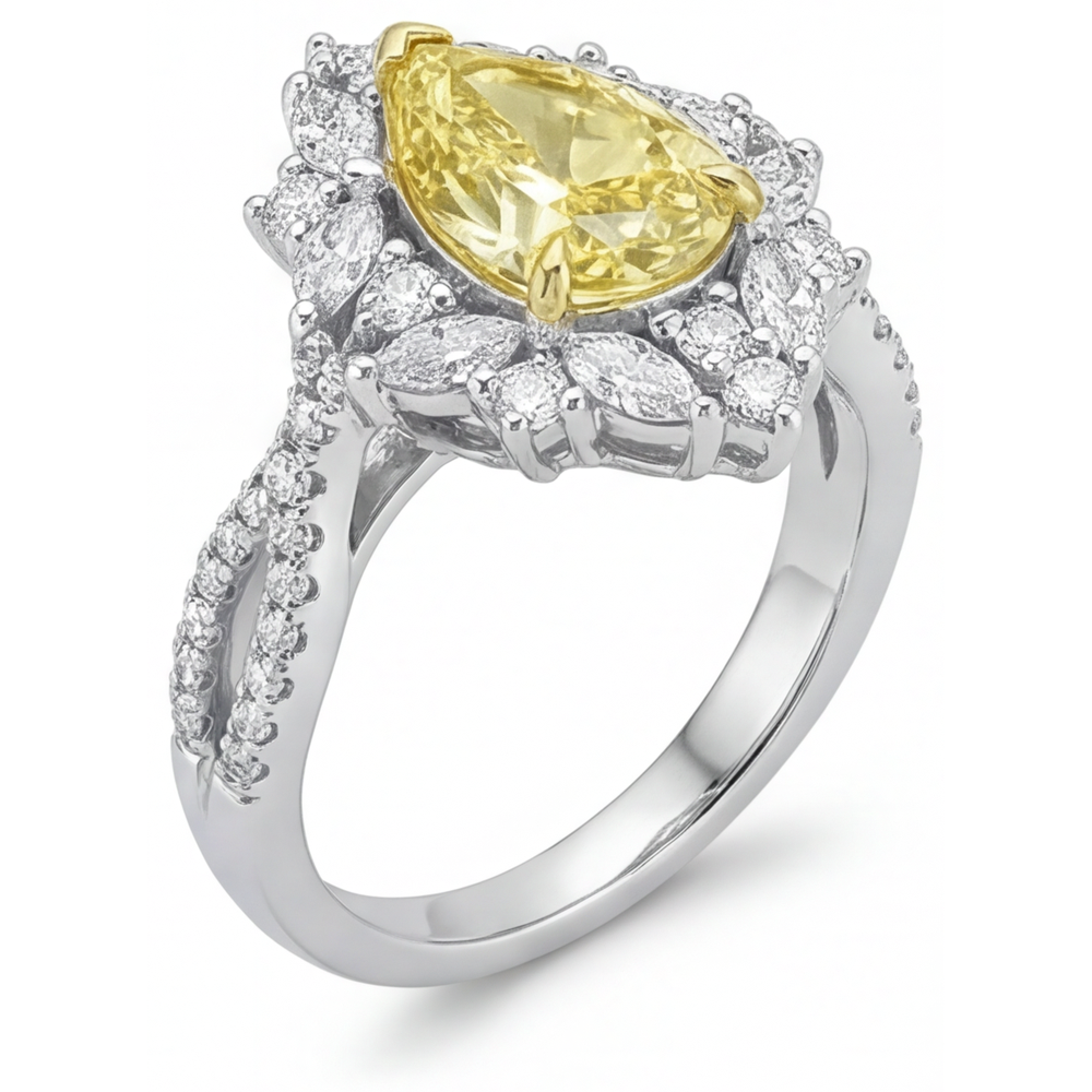 Pear Shape Canary Yellow Diamond ring in 14 Karat Two Tone Gold – angle view