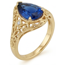 Pear Cut Cornflower Blue Sapphire ring in 14K Yellow Gold – side view