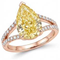 Luxurious Solitaire with Side Stones with VVS Fancy Yellow