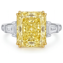 Fancy Yellow Diamond Radiant Three Stone Ring in 14 Karat Two Tone Gold – main view