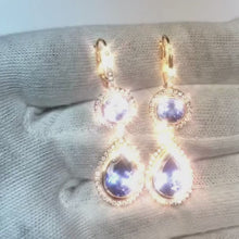 9 Carat Tanzanite Dangle Earrings With 14K White Gold