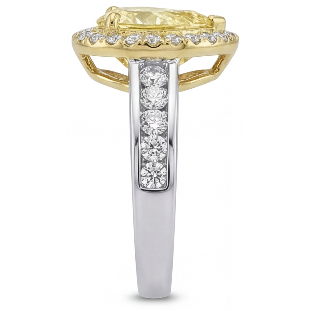 Pear Cut Yellow Canary Diamond ring in 14 Karat Two Tone Gold – top view