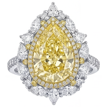Pear Shape Yellow Canary Diamond ring in 14 Karat Two Tone Gold – front view