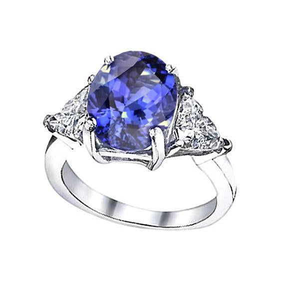 8.01 Carats Oval Tanzanite Diamond Three Stone Anniversary Ring