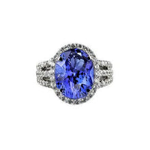 Big Oval Tanzanite With Small Round Diamonds 6.70 Ct Ring Gold 14K