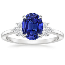 Oval Solitaire Blue Sapphire Ring With Pear Side Stones 4.50 Carats
