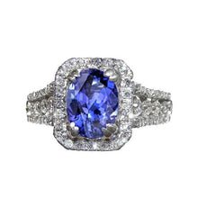 Oval Tanzanite And Round Pave Diamonds 5.70 Carat Ring WG 14K
