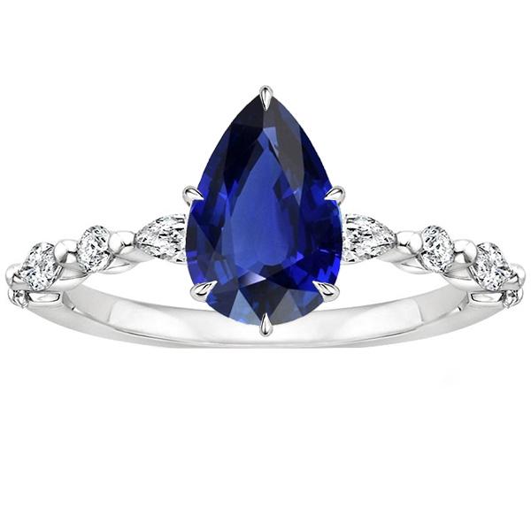 Pear Diamond Anniversary Ring With Blue Sapphire Center Gold 5 Carats